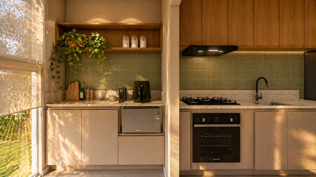 Cozinha com revestimento verde-sálvia e plantas